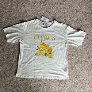 Petal and Pup Citrus Tee - White (oversized)